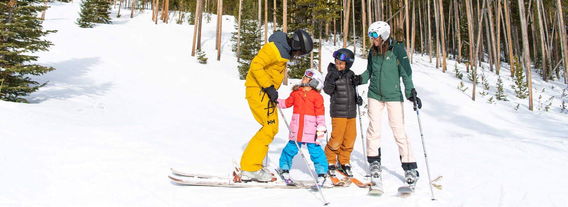Family in ski gear