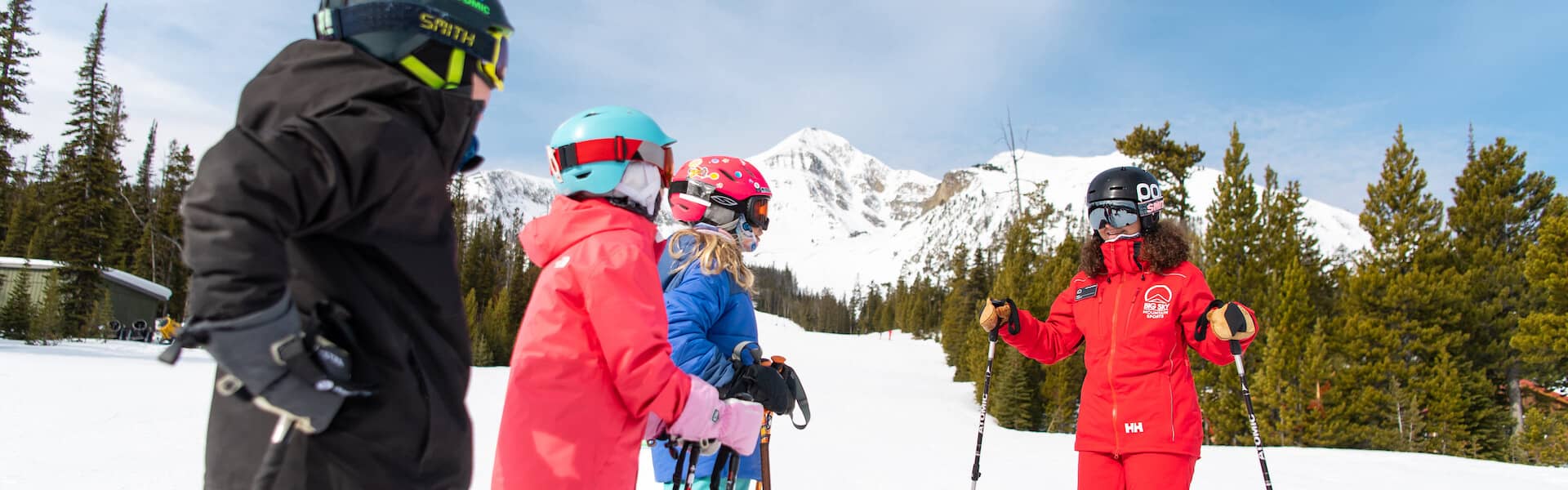 Kids and ski instructor