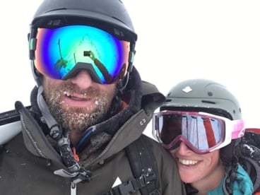 Couple in ski gear