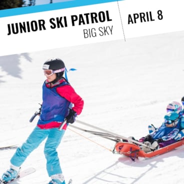 Girl on skis carrying a sled with another girl sitting in it | SheJumps Junior Ski Patrol Wild Skills Clinic